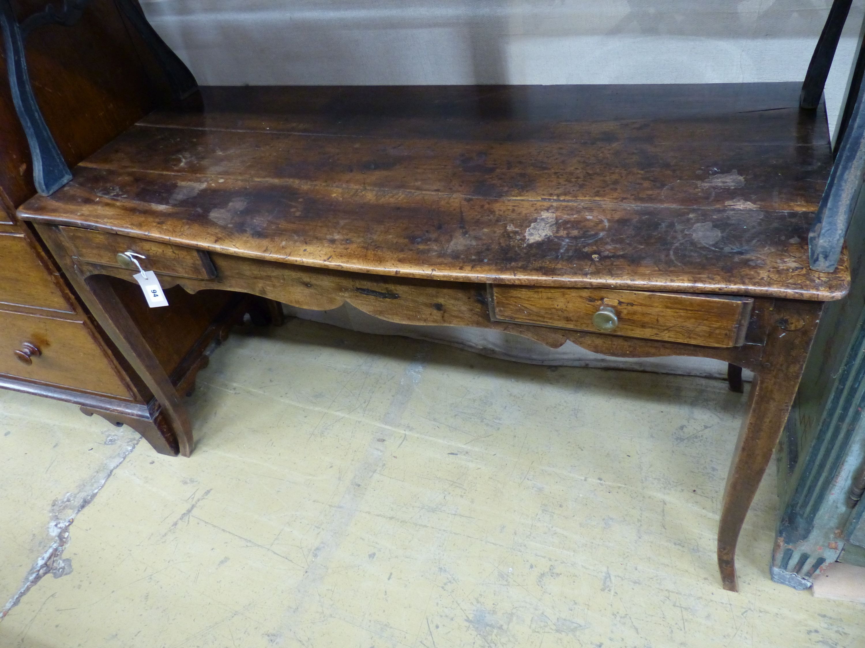 An 18th / 19th century French fruitwood two drawer side table, width 126cm, depth 56cm, height 70cm
